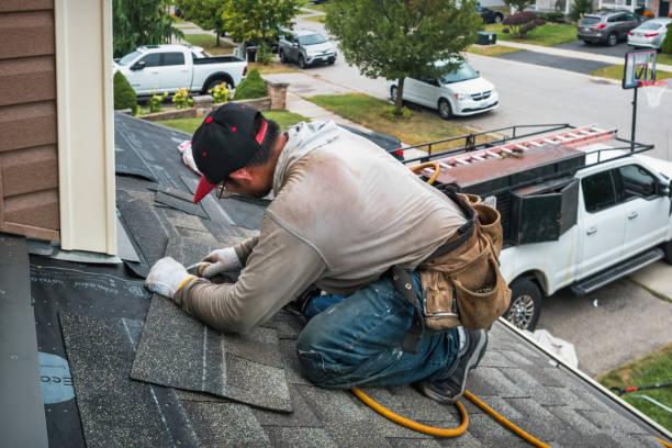 Professional Emergency Roof Repair technician working in New Paris, OH